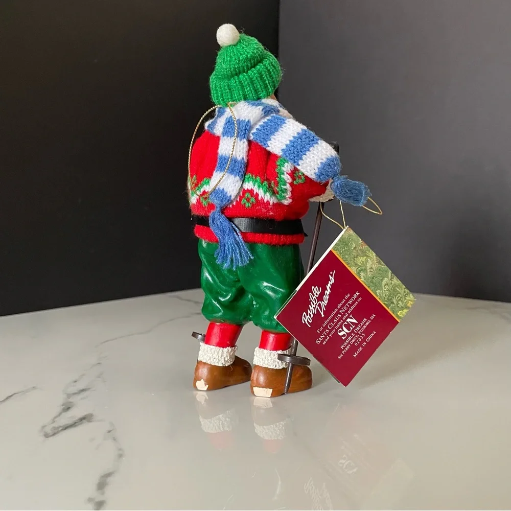 Skier Santa Ornament - Possible Dreams Clothtique by Dept. 56